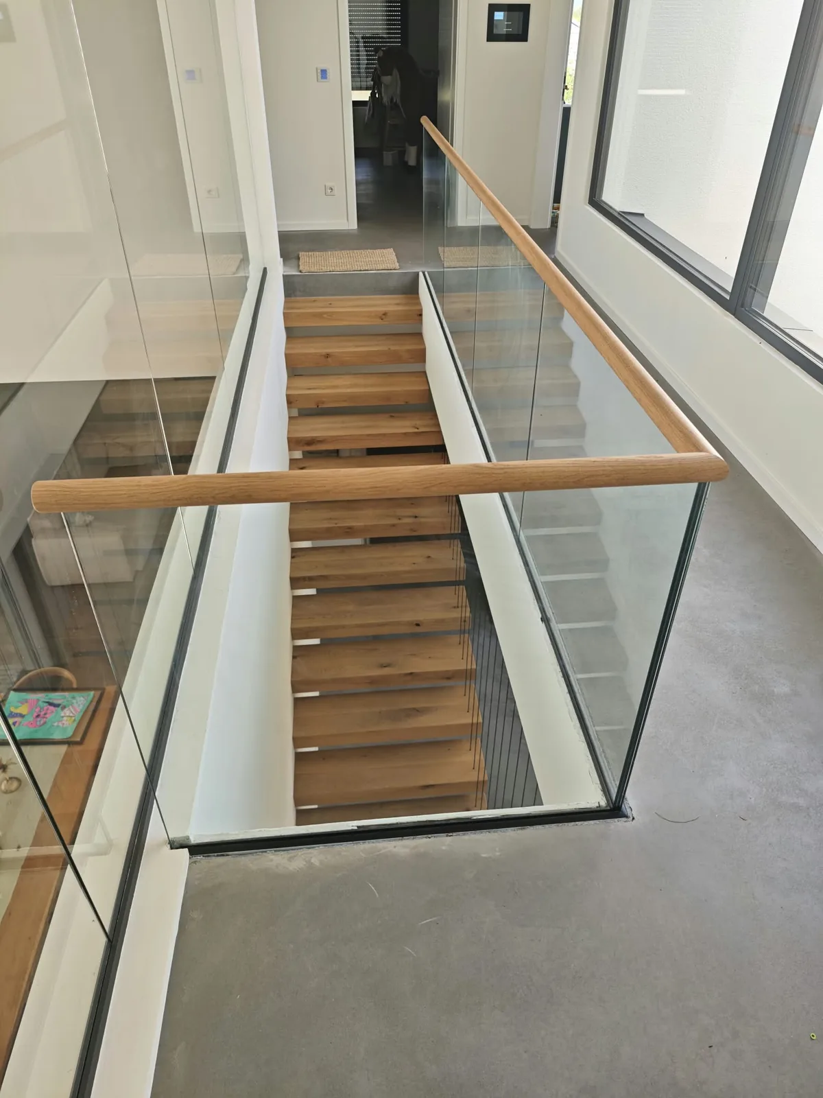 Freitragende Treppe mit Glasgeländer, KuhnWerk Saar Neunkirchen